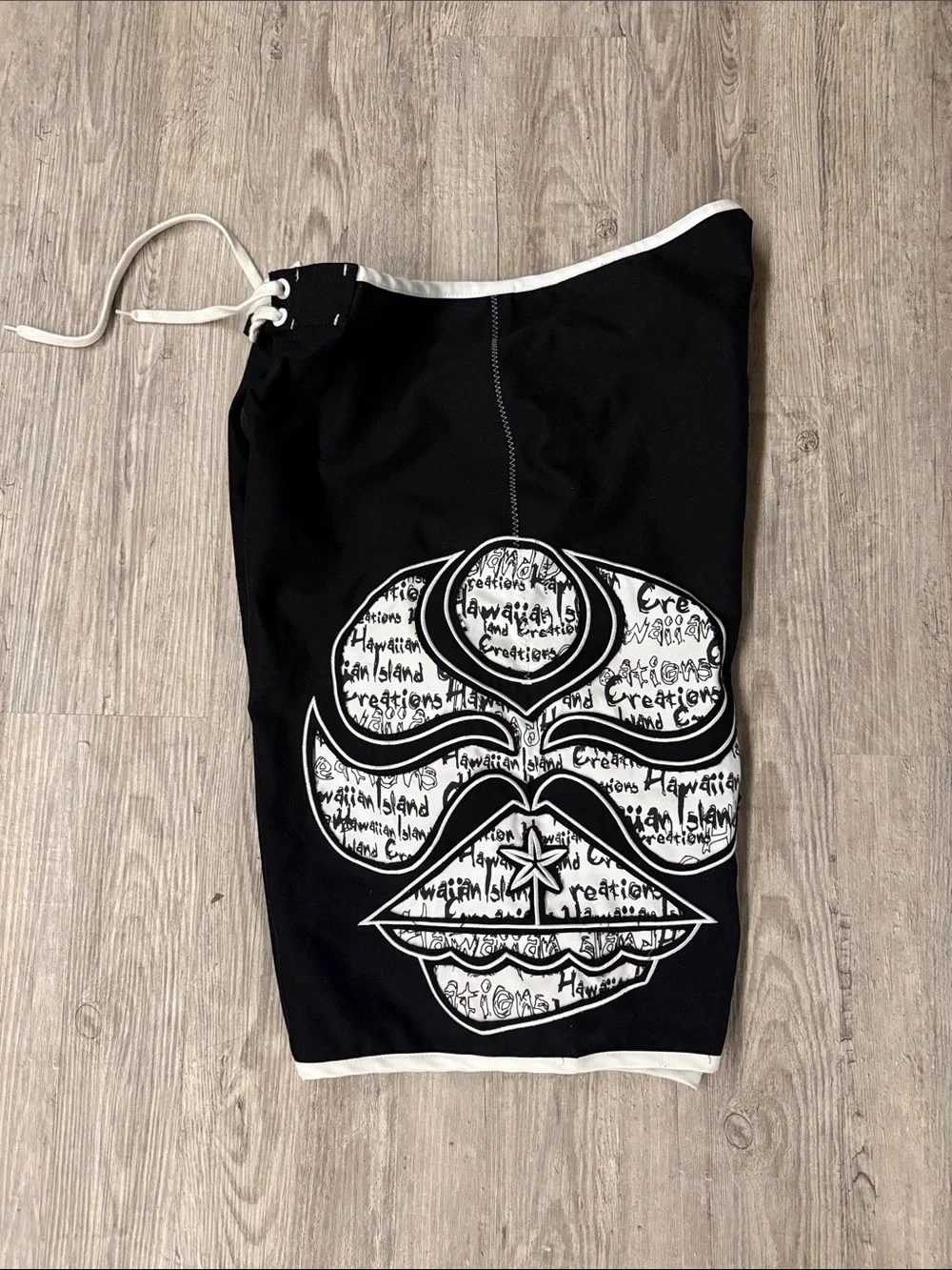 Black Men's Swim Board Shorts with White Contrast and Side Graphic